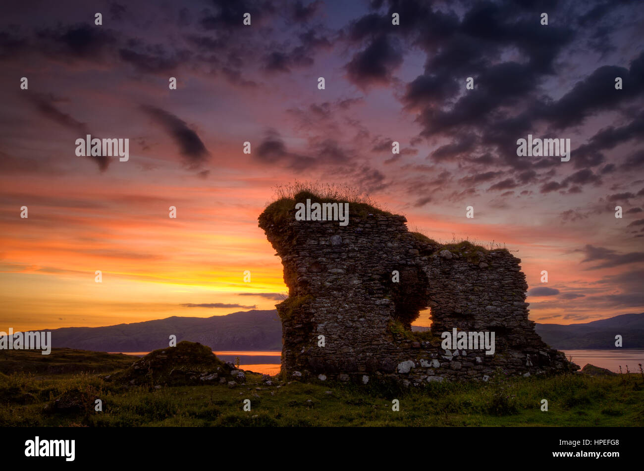 Achadun Castle remains in late sunset, Lismore, Scotland Stock Photo