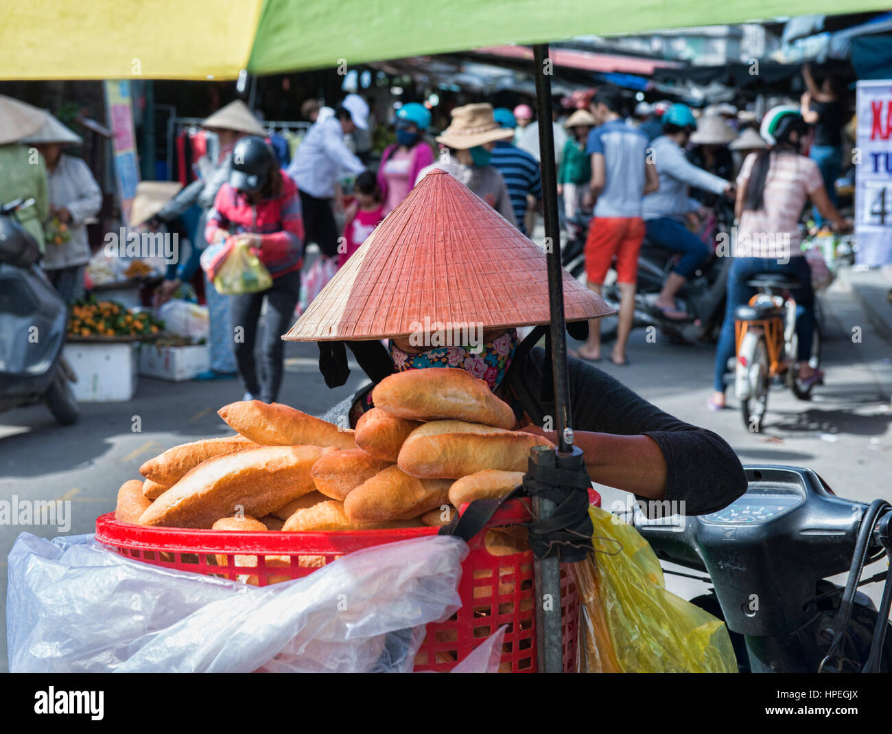 French bread vendor, Hoi An, Vietnam Stock Photo Alamy