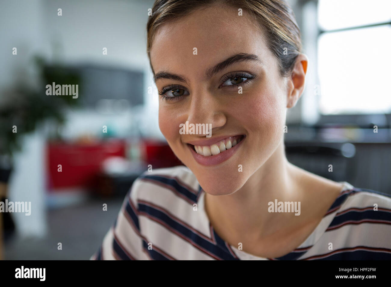 Portrait of smiling female executive at creative office Stock Photo - Alamy