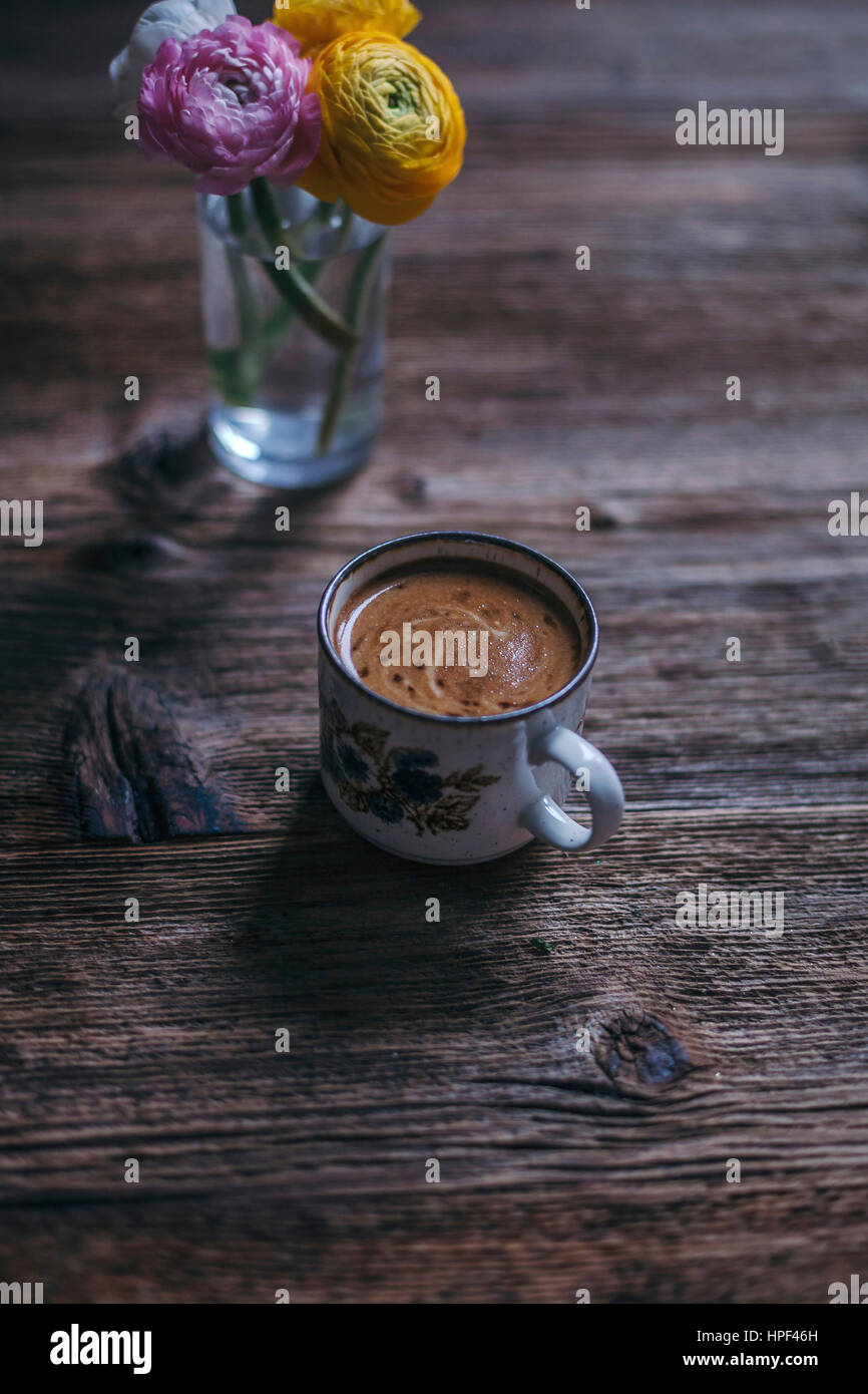 Cup of black coffee on a rustic wooden table Stock Photo
