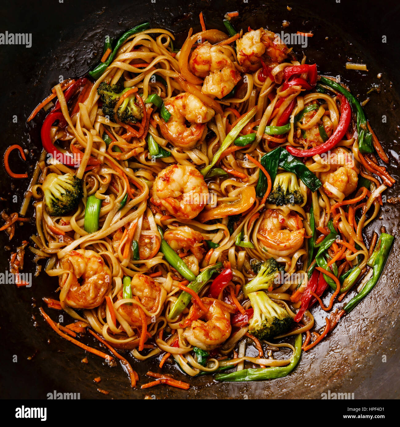 Udon stirfry noodles with shrimp in wok pan close up Stock Photo Alamy