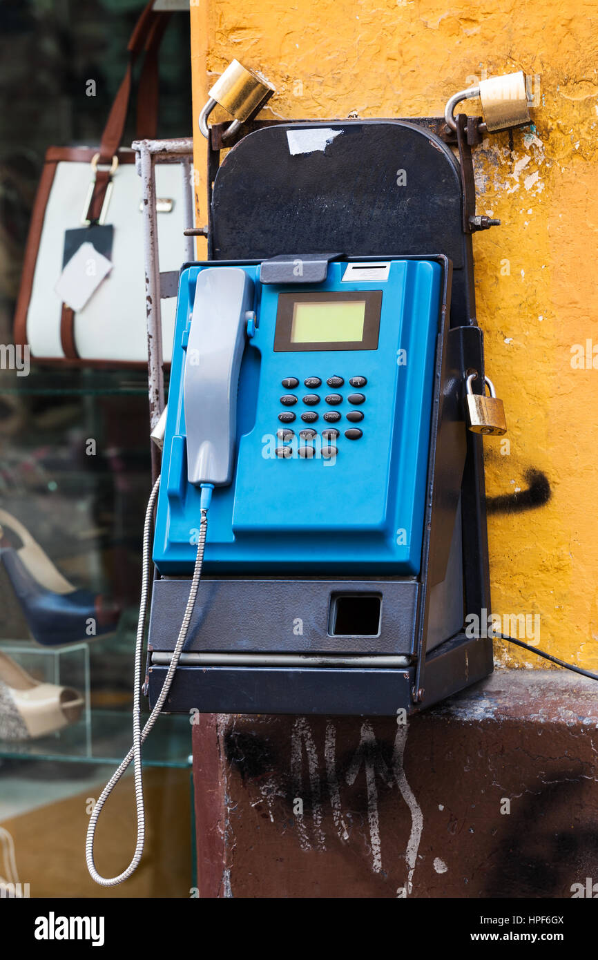 old pay telephone on a city street Stock Photo - Alamy