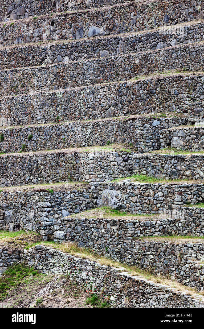 Machu Picchu, the old wall as background Stock Photo - Alamy