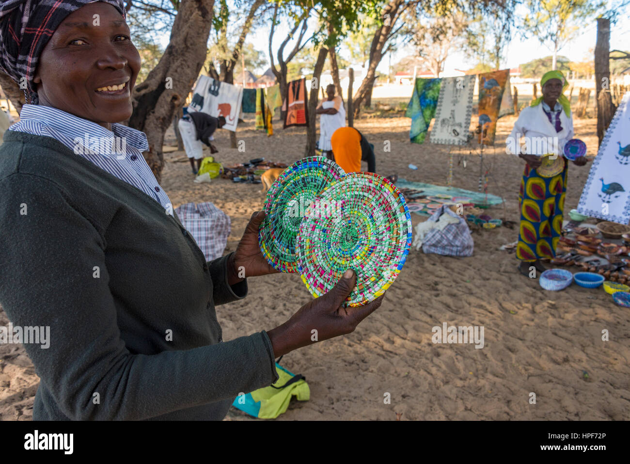 Zimbabwean woman create hand crafted bowls near Hwange National Park. Stock Photo