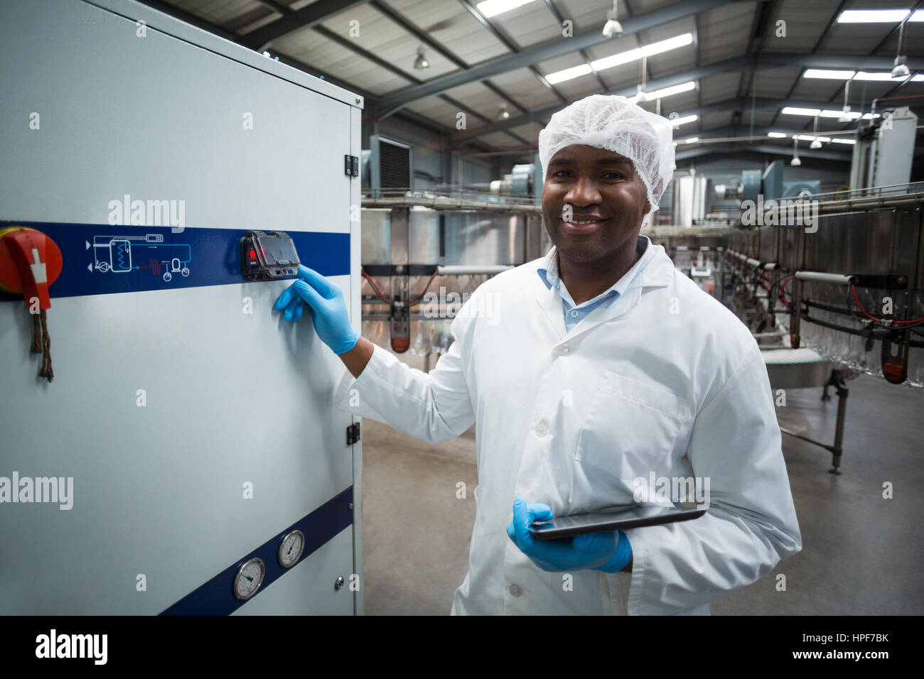 Professional engineer operating machine hi-res stock photography and ...