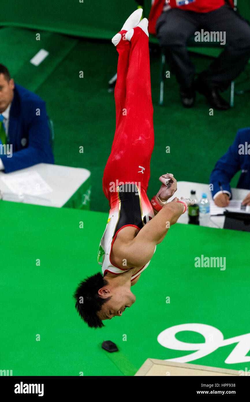Rio de Janeiro, Brazil. 8 August 2016.  Koji Yamamuro (JPN) preforms on the Rings as part of the Gold medal winning Men's Gymnastics Team  at the 2016 Stock Photo
