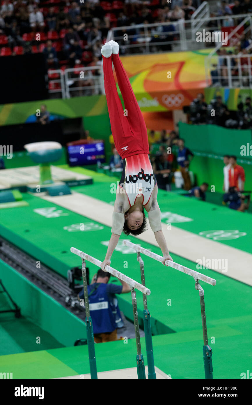 Rio de Janeiro, Brazil. 8 August 2016. Ryohei Kato (JPN) preforms on the Parallel Bars as part of the Gold medal winning Men's Gymnastics Team  at the Stock Photo
