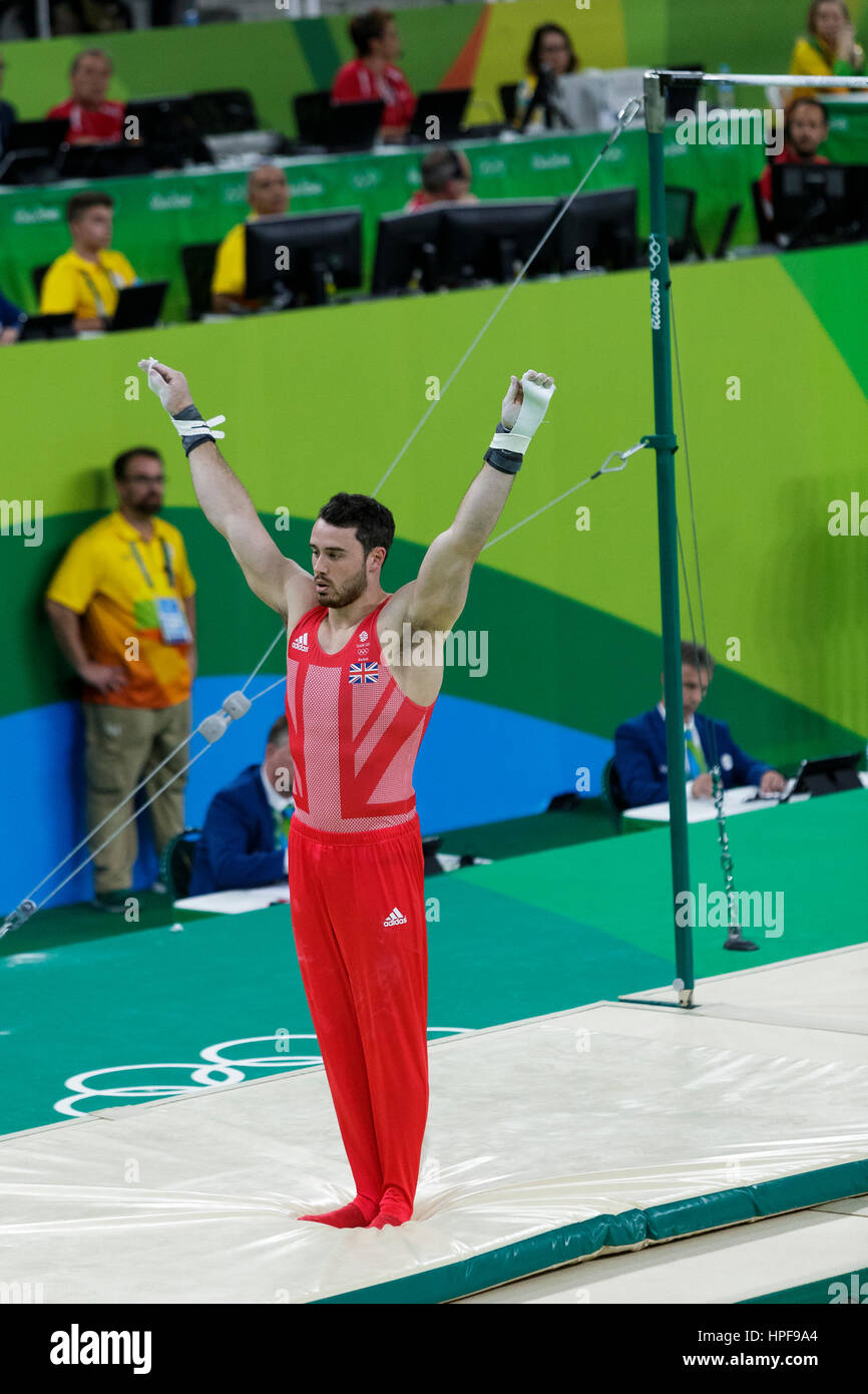 Rio de Janeiro, Brazil. 08 August 2016 Kristian Thomas (GBR) performs on the Horizontal Bar during Men's artistic team final at the 2016 Olympic Summe Stock Photo