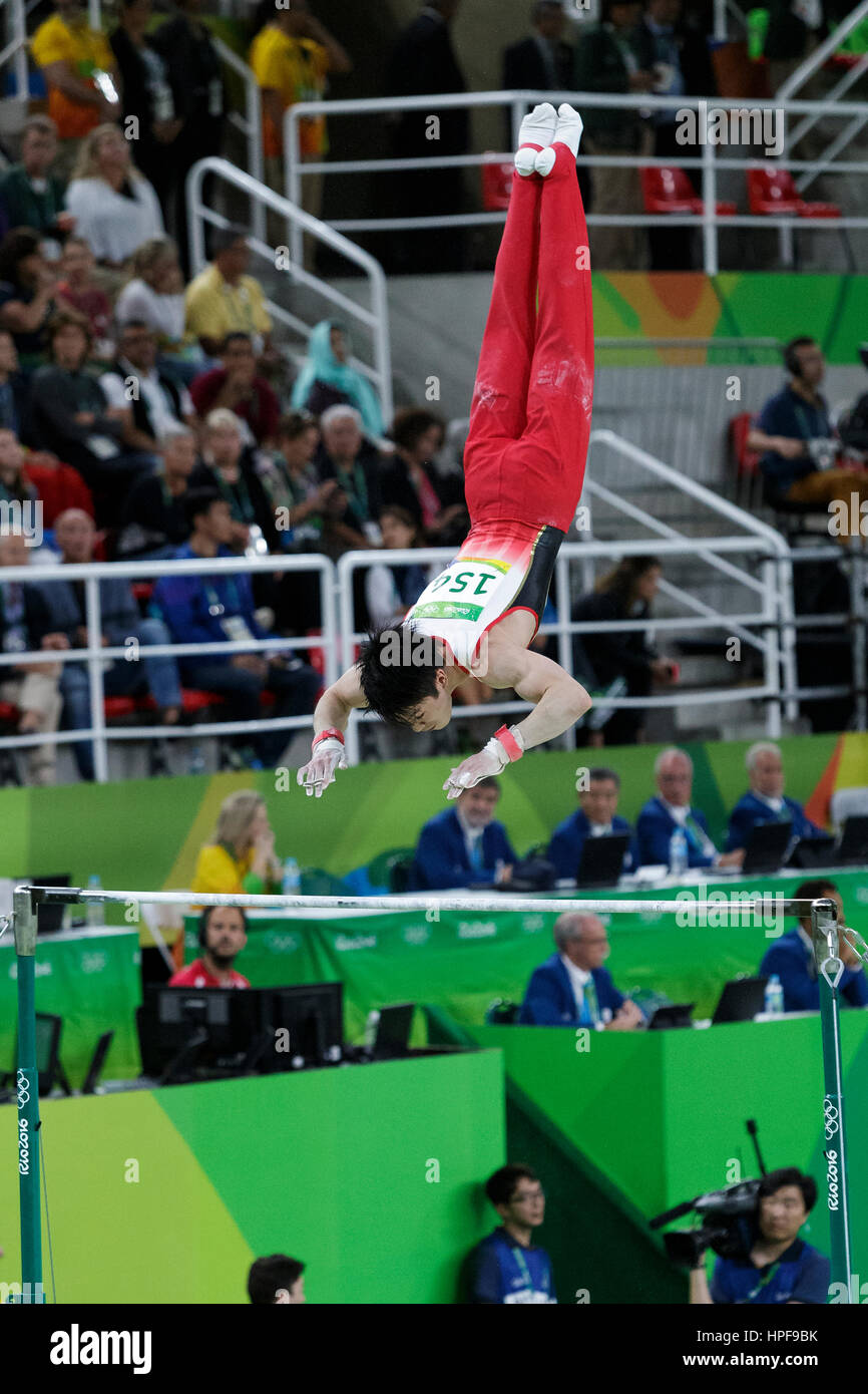 Rio de Janeiro, Brazil. 8 August 2016. Kohei Uchimura (JPN) preforms on the Horizontal Bar as part of the Gold medal winning Men's Gymnastics Team  at Stock Photo