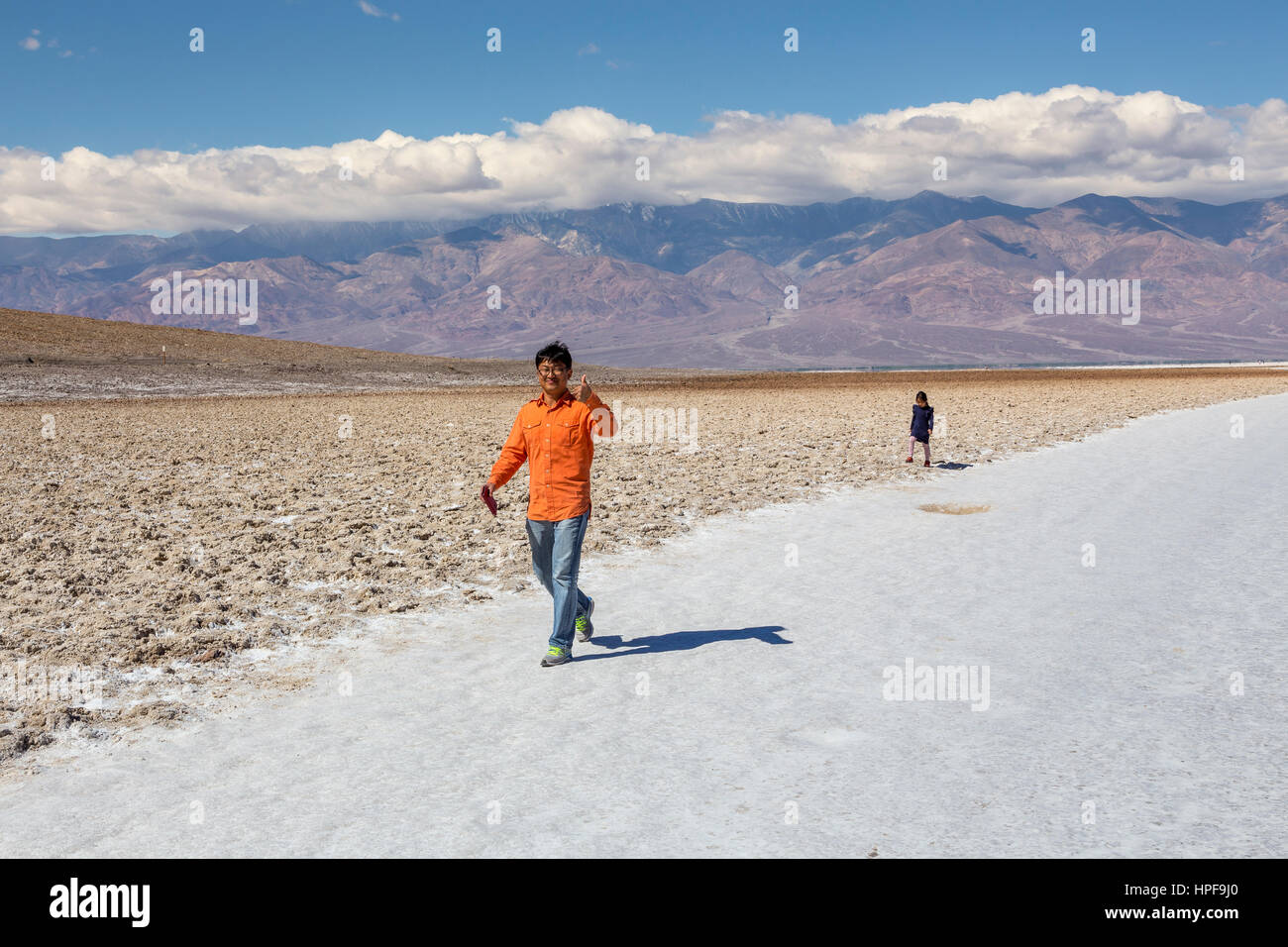 father and daughter, tourists, visitors, visiting, Badwater Basin, 282 feet below sea level, Death Valley National Park, Death Valley, California Stock Photo