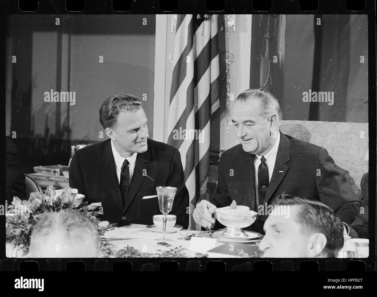 Rev Billy Graham and President Lyndon B Johnson at the Annual Presidential Prayer Breakfast, Washington, DC, 02/05/1964. Photo by Marion S Trikosko Stock Photo