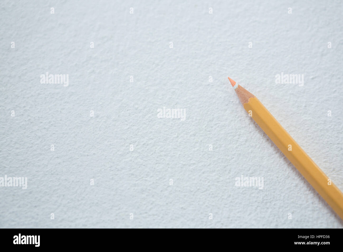 Closeup of peach color pencil on white background Stock Photo Alamy