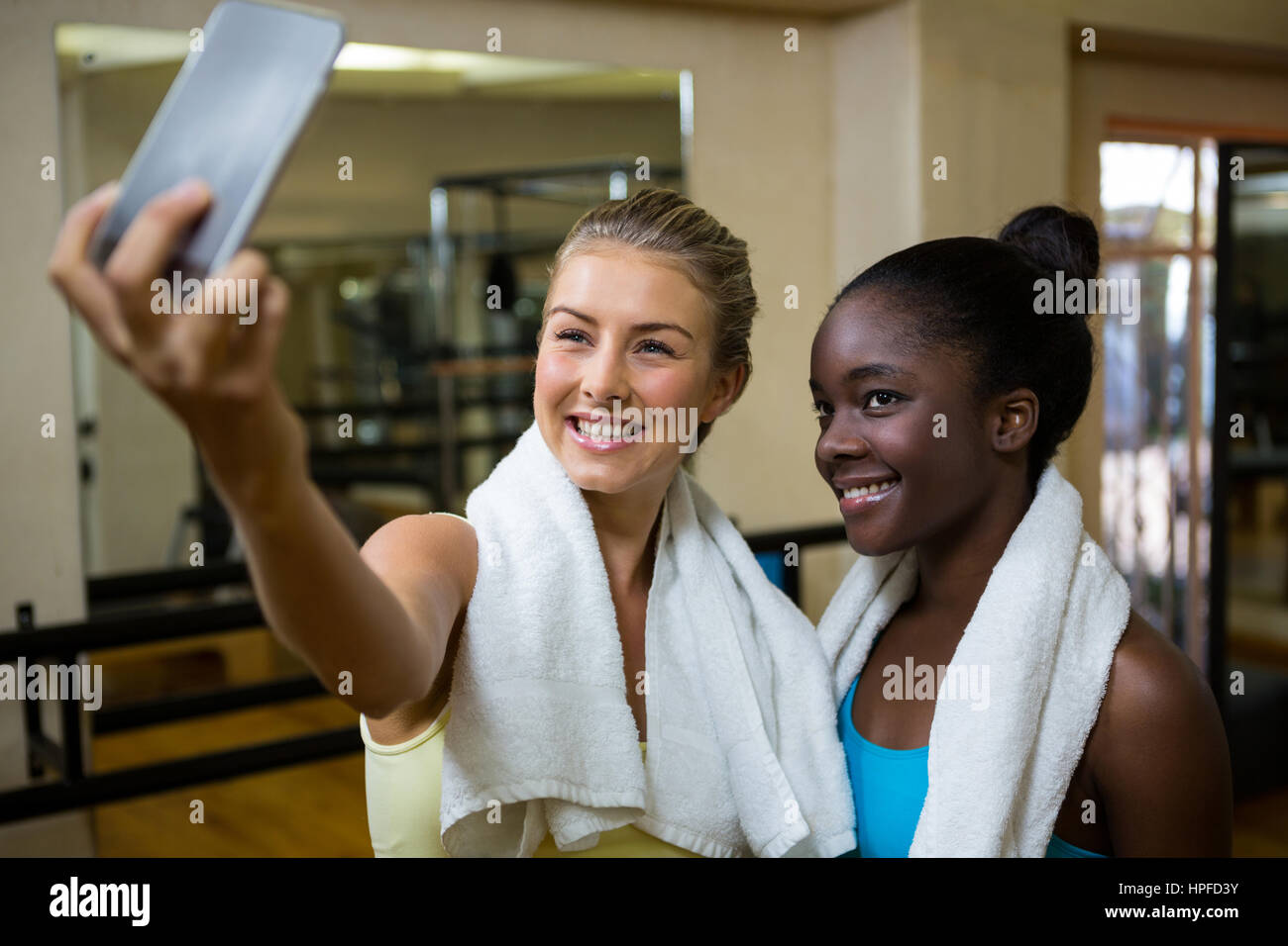 Beautiful fit women taking selfie hi-res stock photography and images ...