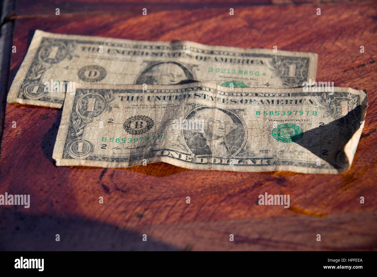 Worn american dollars in circulation in Zimbabwe Stock Photo