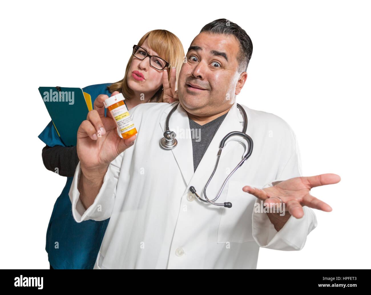 Goofy Doctor and Nurse with Prescription Bottle Isolated on a White Background. Stock Photo