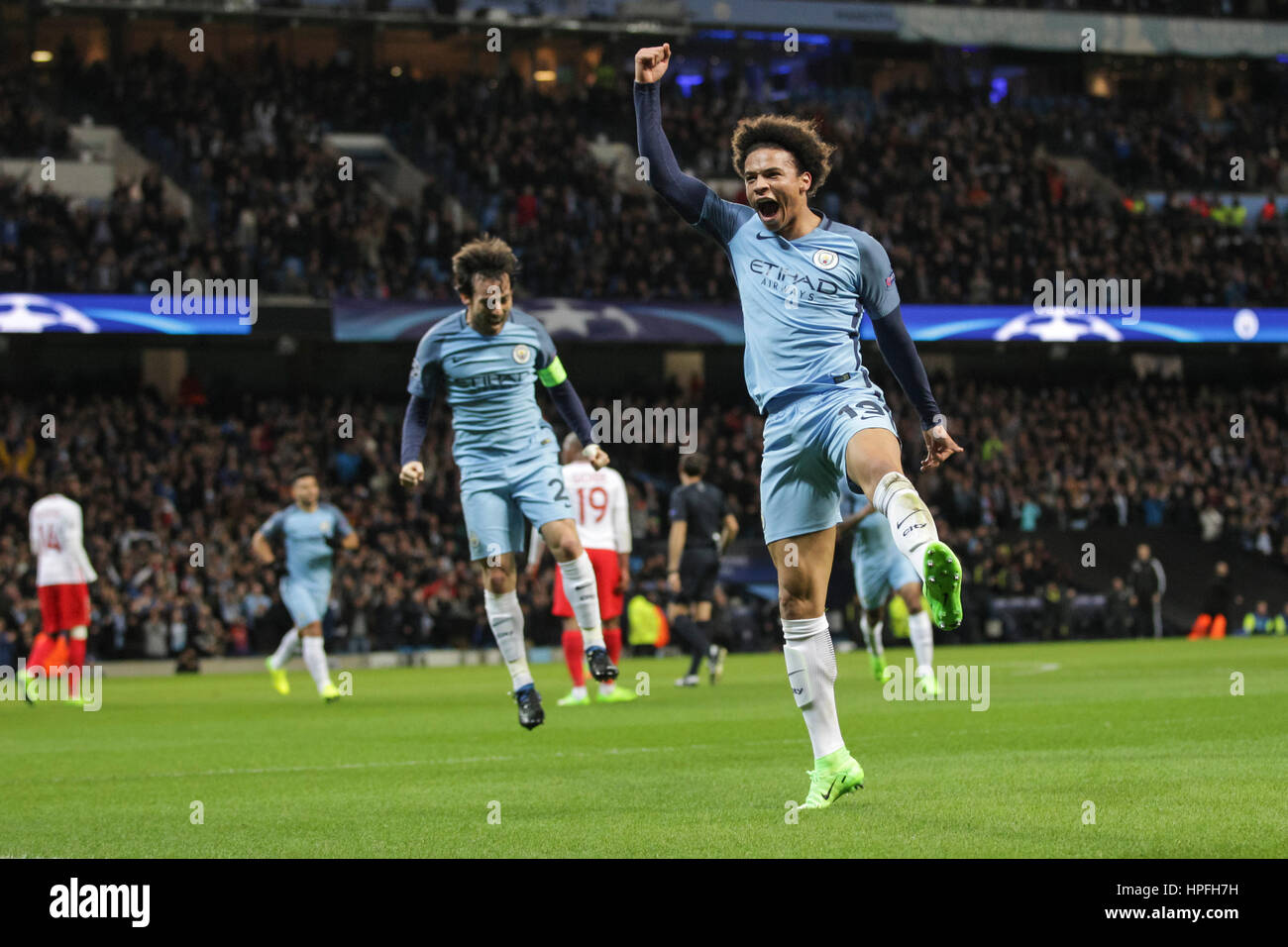 Manchester, UK. 21st Feb, 2017. Leroy Sane of Manchester City celebrates his side's first goal during the UEFA Champions League Round of 16 first leg match between Manchester City and AS Monaco at the Etihad Stadium on February 21st 2017 in Manchester, England. Credit: PHC Images/Alamy Live News Stock Photo