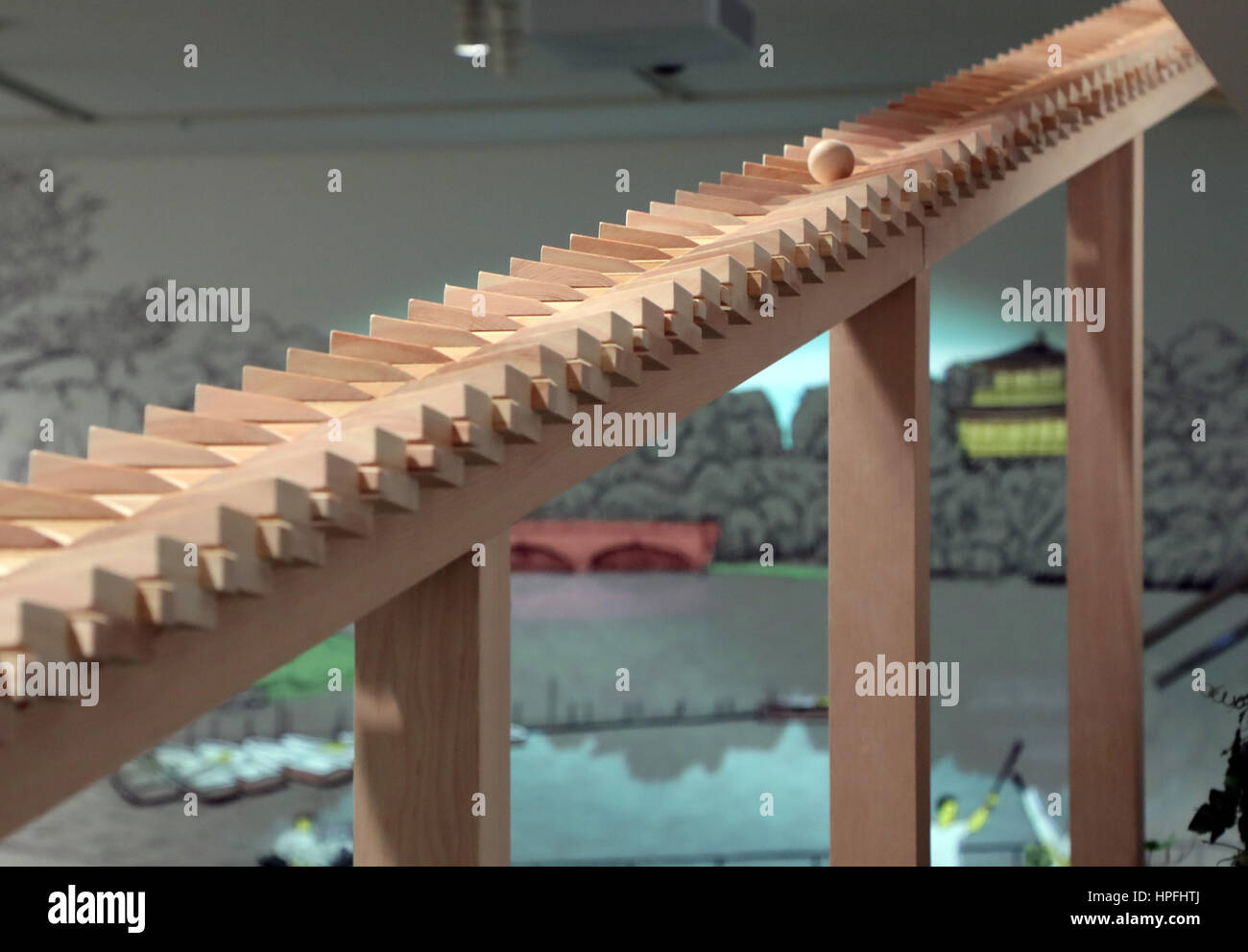 Tokyo, Japan. 21st Feb, 2017. An installation of a 34m long xylophone, a wooden ball rolls on