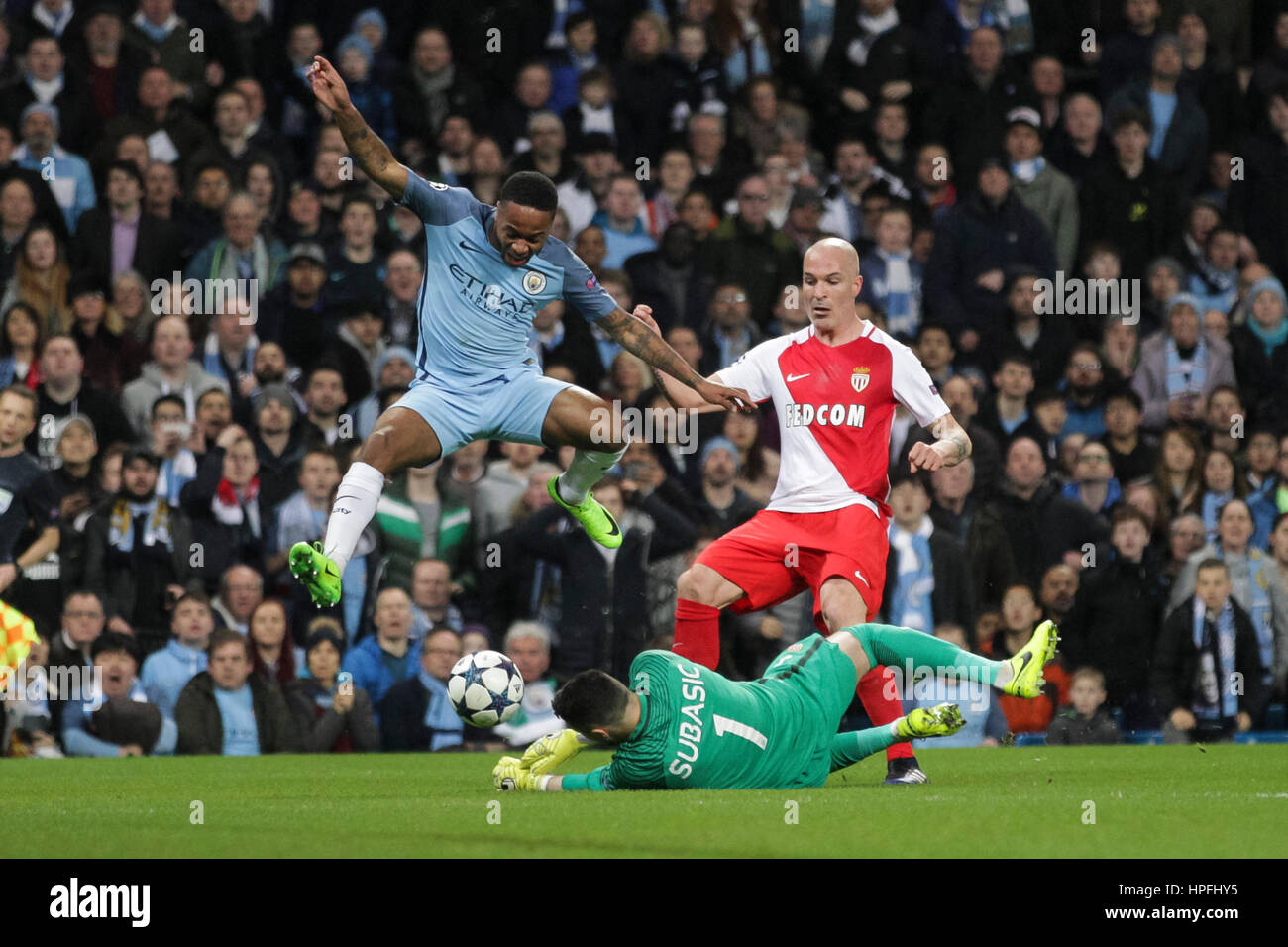 Manchester, UK. 21st Feb, 2017. Danijel Subasic of Monaco saves at Raheem Sterling of Manchester City's feet during the UEFA Champions League Round of 16 first leg match between Manchester City and AS Monaco at the Etihad Stadium on February 21st 2017 in Manchester, England. Credit: PHC Images/Alamy Live News Stock Photo