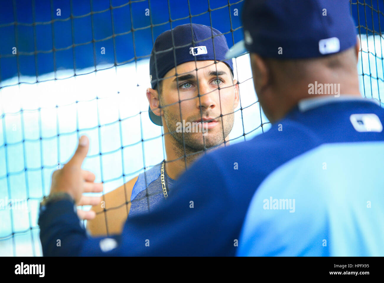 Port Charlotte, Florida, USA. 22nd Feb, 2017. WILL VRAGOVIC | Times.Tampa Bay Rays center fielder Kevin Kiermaier (39) talks with a member of the coaching staff in the batting cage after wet weather cancelled on-field work at Charlotte Sports Park in Port Charlotte, Fla. on Wednesday, Feb. 22, 2017. Credit: Will Vragovic/Tampa Bay Times/ZUMA Wire/Alamy Live News Stock Photo