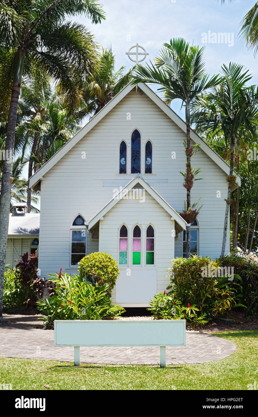 historic white chapel of gothic revival style on shores of coral sea in tropical port douglas queensland australia Stock Photo