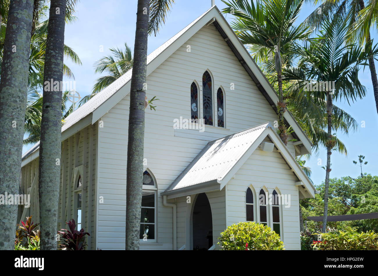 historic gothic revival style chapel on shores of coral sea in tropical port douglas queensland australia Stock Photo