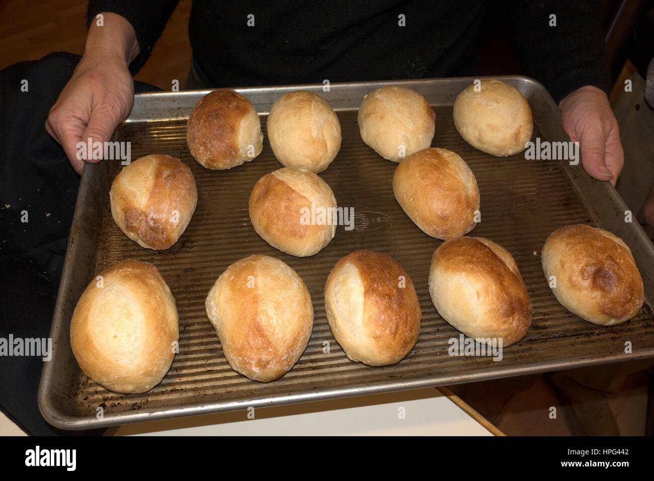 Hot browned rolls just removed from kitchen oven for Thanksgiving dinner. Champlin Minnesota MN USA Stock Photo