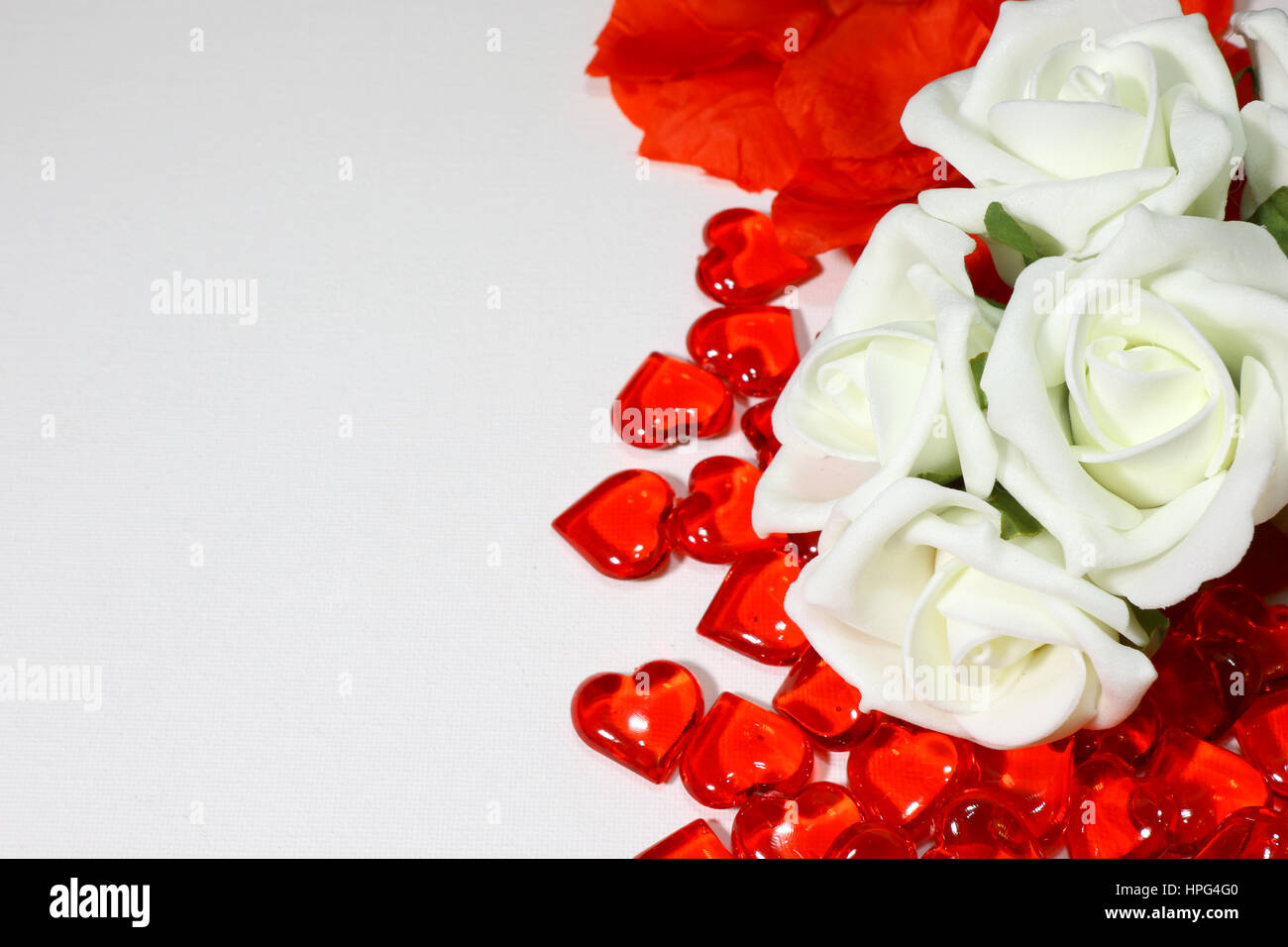 The Concept of a wedding with white roses and heart shapes Stock Photo ...