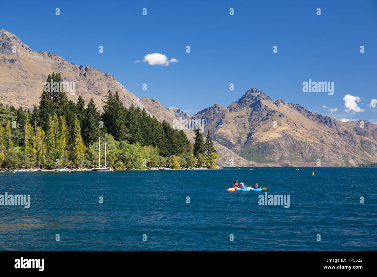 Queenstown, Otago, New Zealand. Kayaking in Queenstown Bay, Lake Wakatipu, Walter Peak in