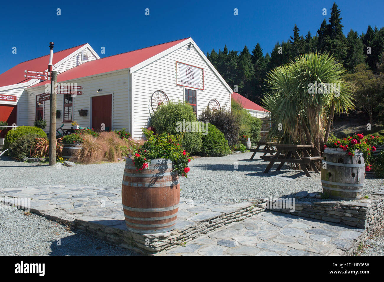 Queenstown, Otago, New Zealand. Colourful buildings and picnic area at Walter Peak High Country Farm, Lake Wakatipu. Stock Photo