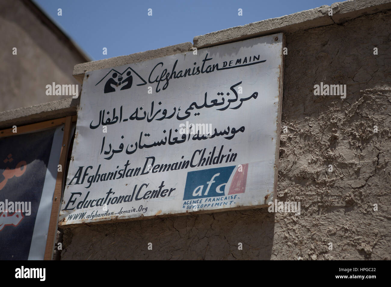 Sign indicating the building belonging to the NGO Afghanistan Demain Stock Photo