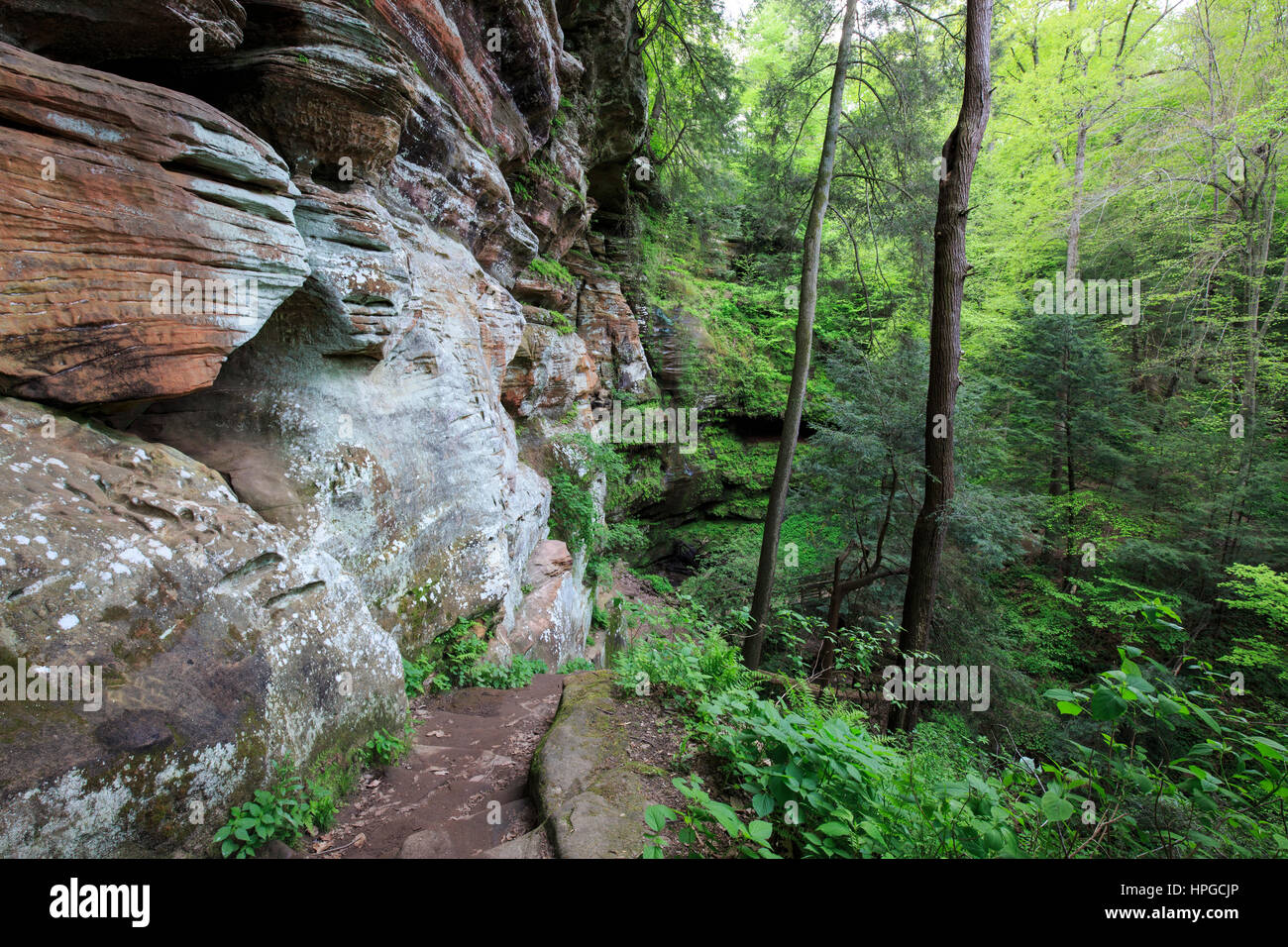 Sandstone walls along trail at Rock House, Hocking Hills State Park ...