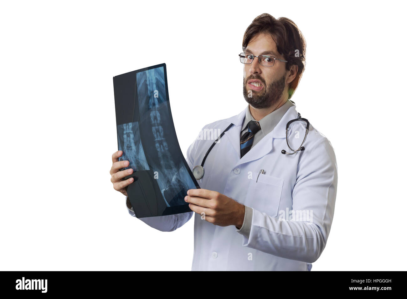 Male doctor looking at a x-Ray on a White background Stock Photo - Alamy