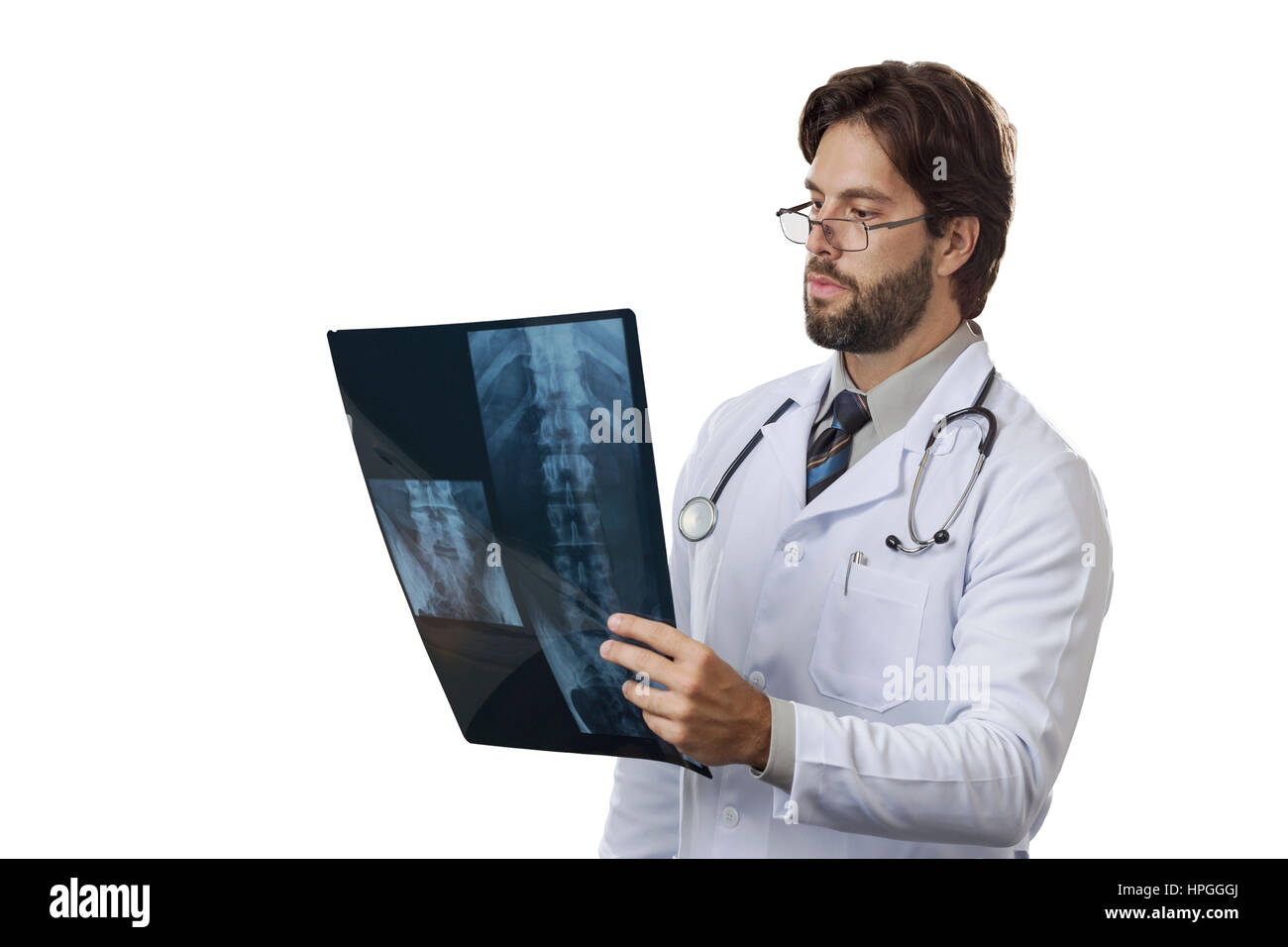Male doctor looking at a x-Ray on a White background Stock Photo - Alamy