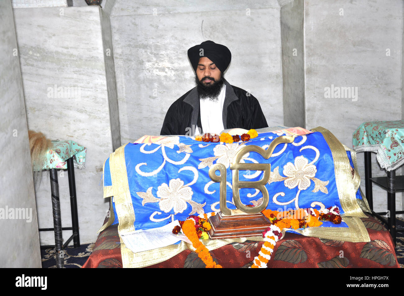A Sikh Priest in the Bangla Sahib Gurudwara, New Delhi, India (Photo Copyright © by Saji Maramon) Stock Photo