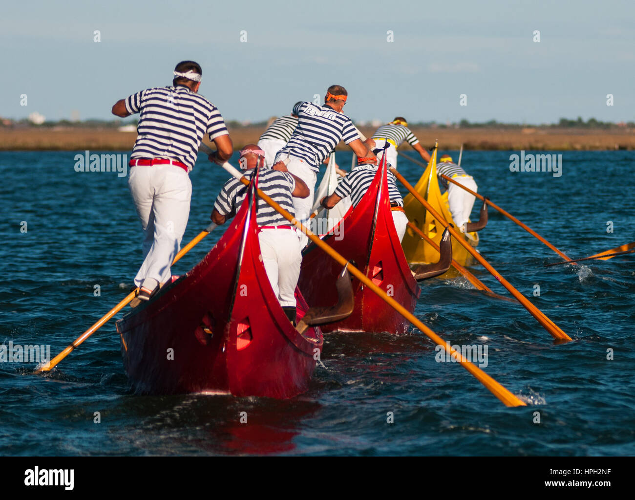 VENICE, ITALY Rowers during a regatta in the lagoon, Italy. All the world knows the