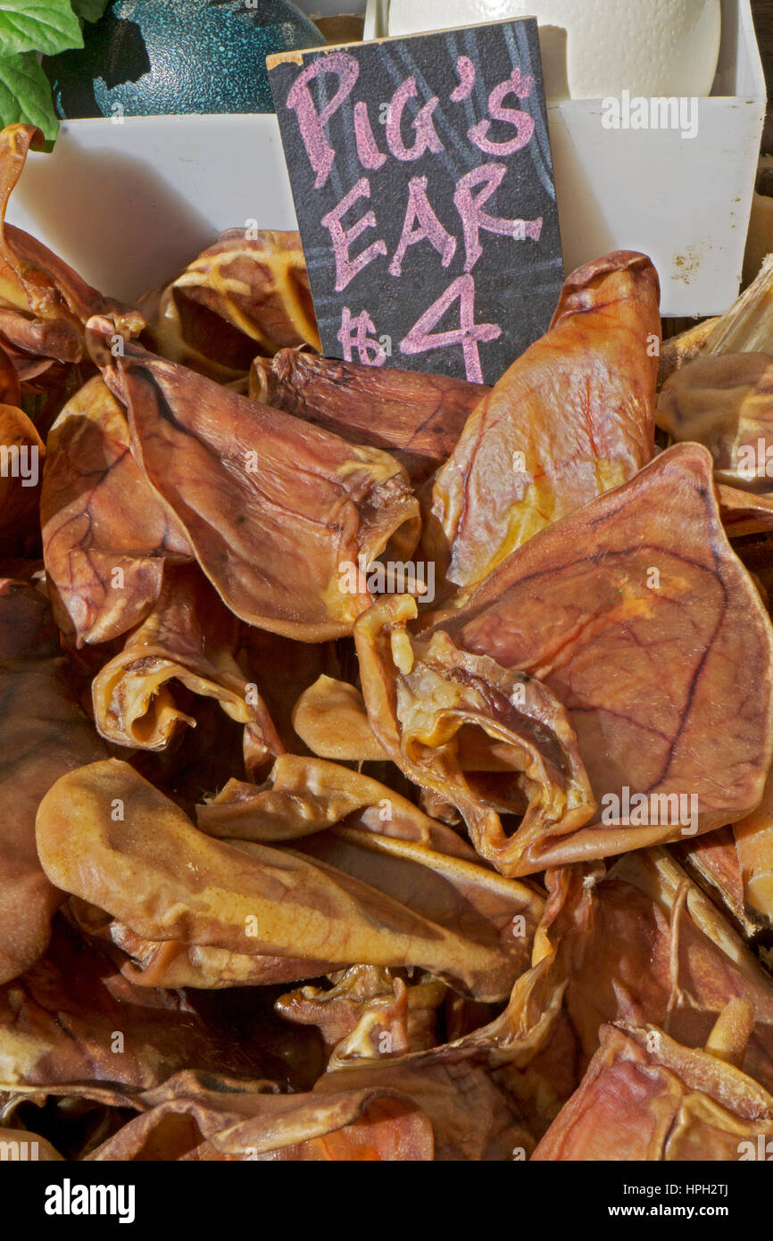 Dried pig's ears for sale at the Union Square outdoor market in lower Manhattan, New York, USA. Stock Photo