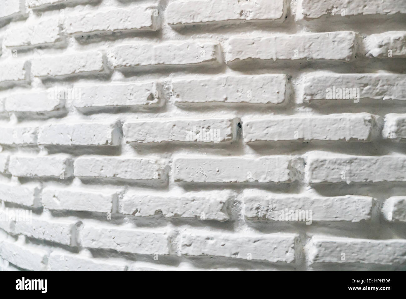 the perspective white brick wall texture background Stock Photo - Alamy
