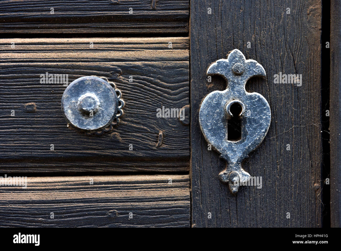 Vintage door mounting and keyhole of a wooden antique door Stock Photo