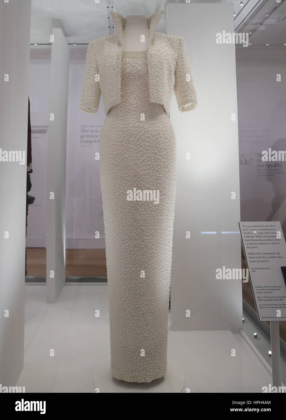 A strapless white silk crepe dress and jacket, embroidered with sequins and pearls, designed by Catherine Walker and worn by the Princess of Wales in 1989, at the preview of Diana: Her Fashion Story exhibition at Kensington Palace in London, which celebrates the style of Diana, Princess of Wales. Stock Photo