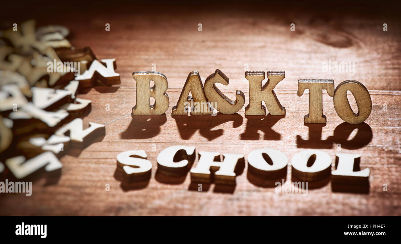 word Back to School on wooden background. Education concept Stock Photo ...