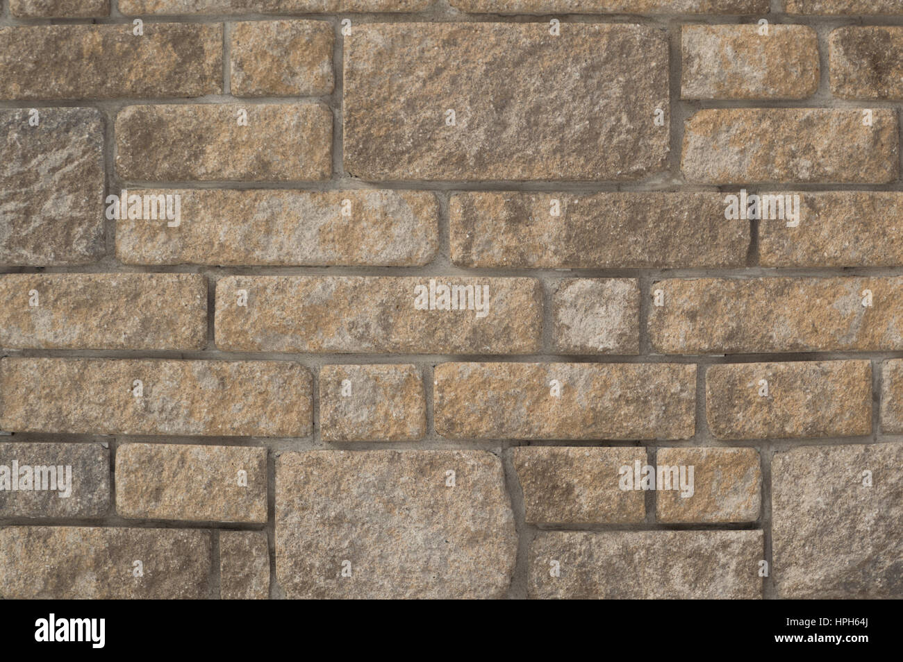 Rugged limestone wall filled with cement mortar Stock Photo Alamy