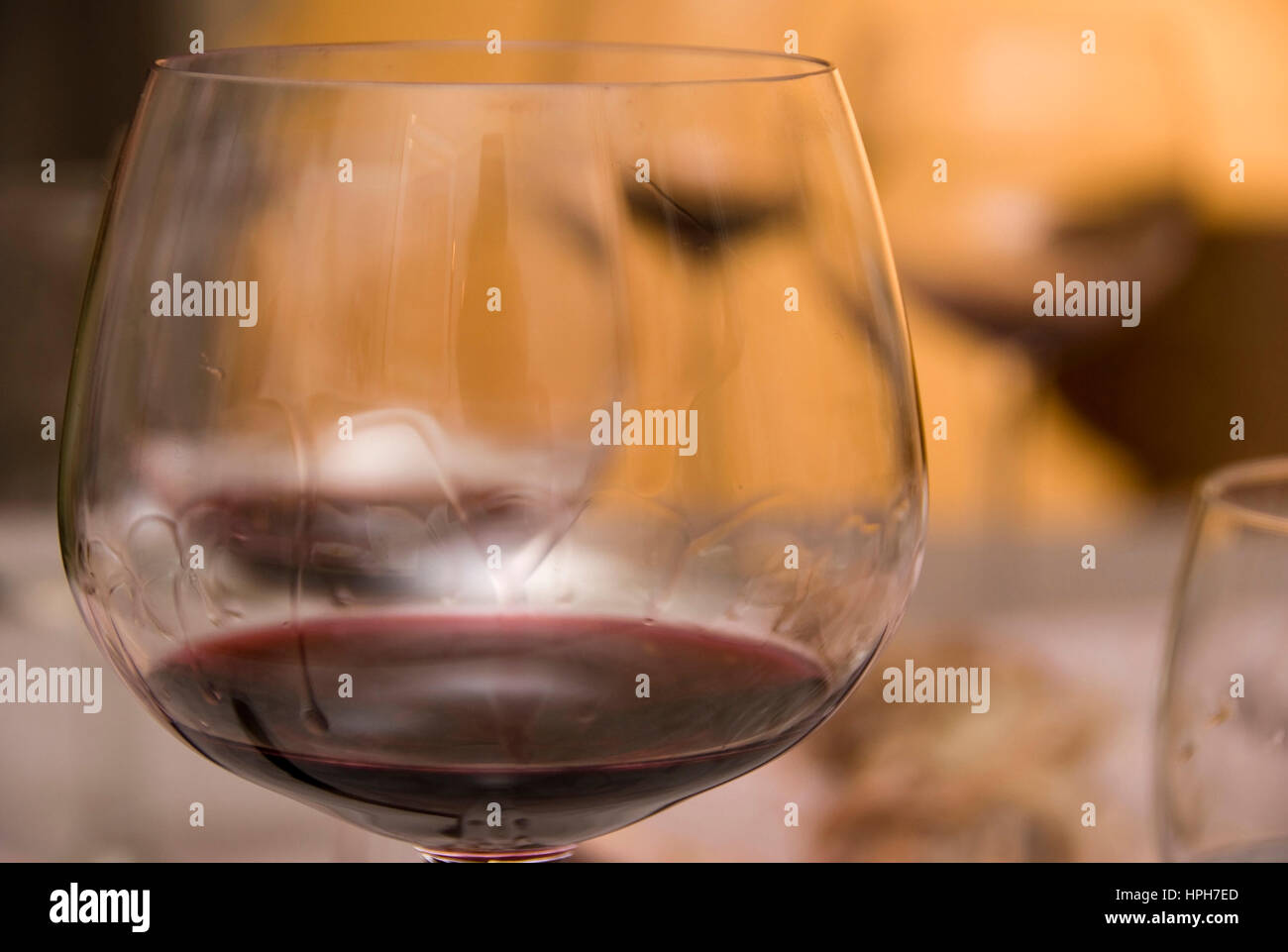 Rotweinglas, fast leer - glass of red wine Stock Photo