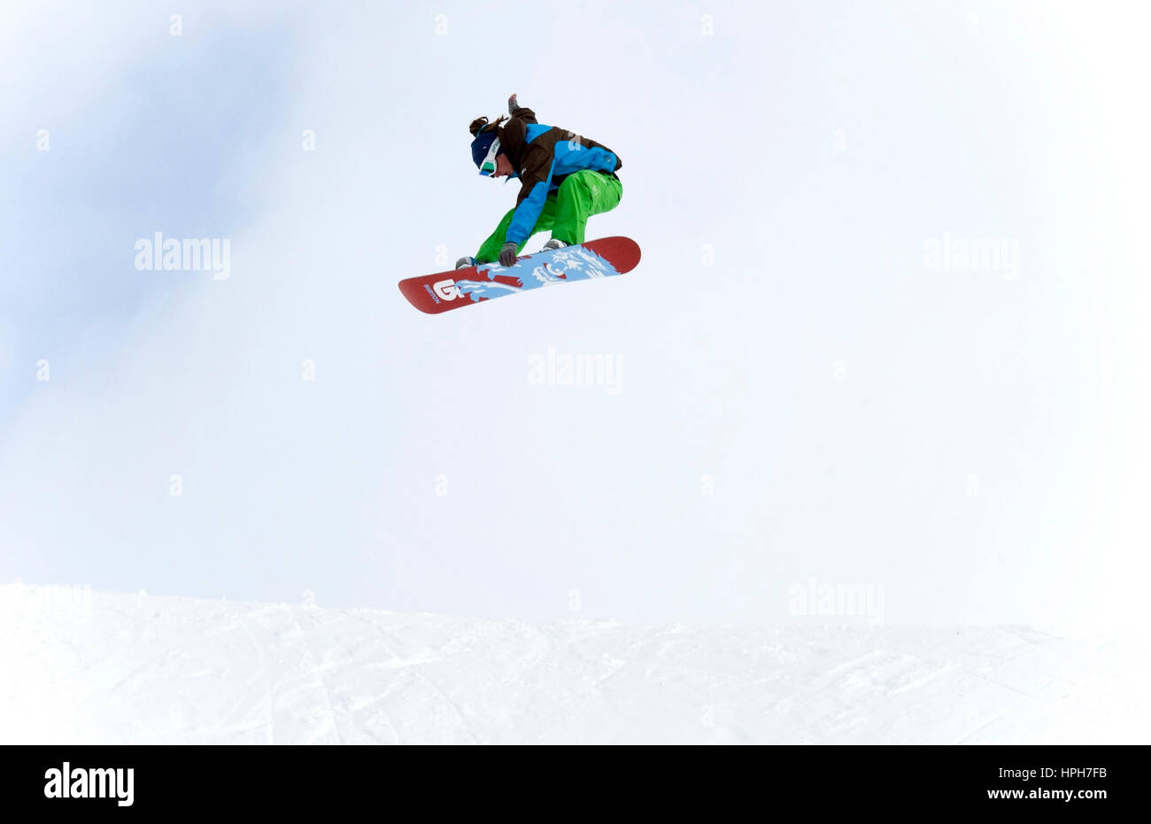 Snowboarder im Sprung - snowboarder jumping Stock Photo
