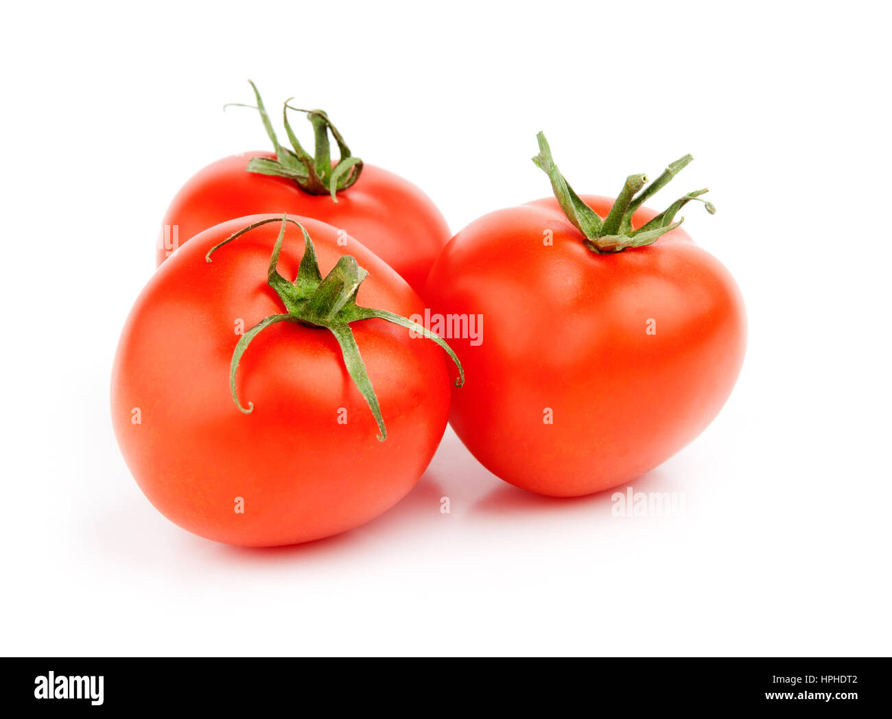 tomatos isolated on a white background Stock Photo - Alamy