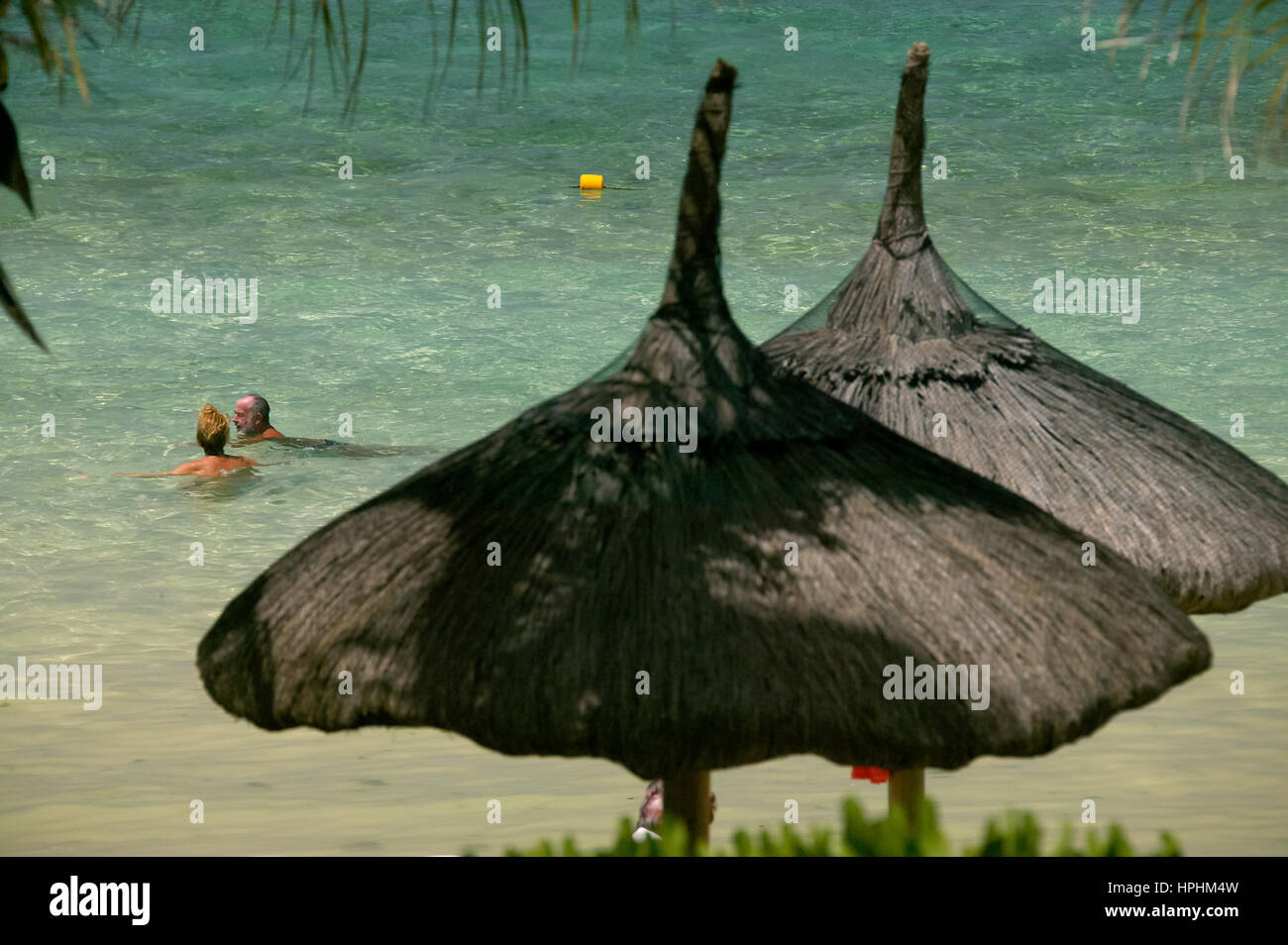 Mauritius, Luxury hotel Heritage, Beach umbrellas, Beach, Tourists