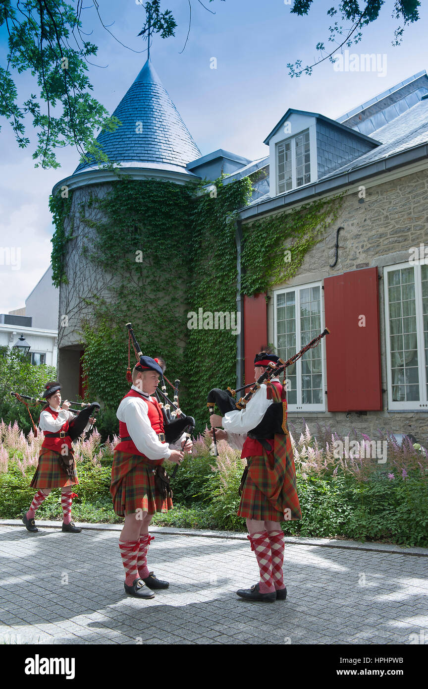 Canada. Province of Quebec. Montreal. Old town. Bag pipers in front of Ramezay castle built in 1756. Today, History Museum Stock Photo