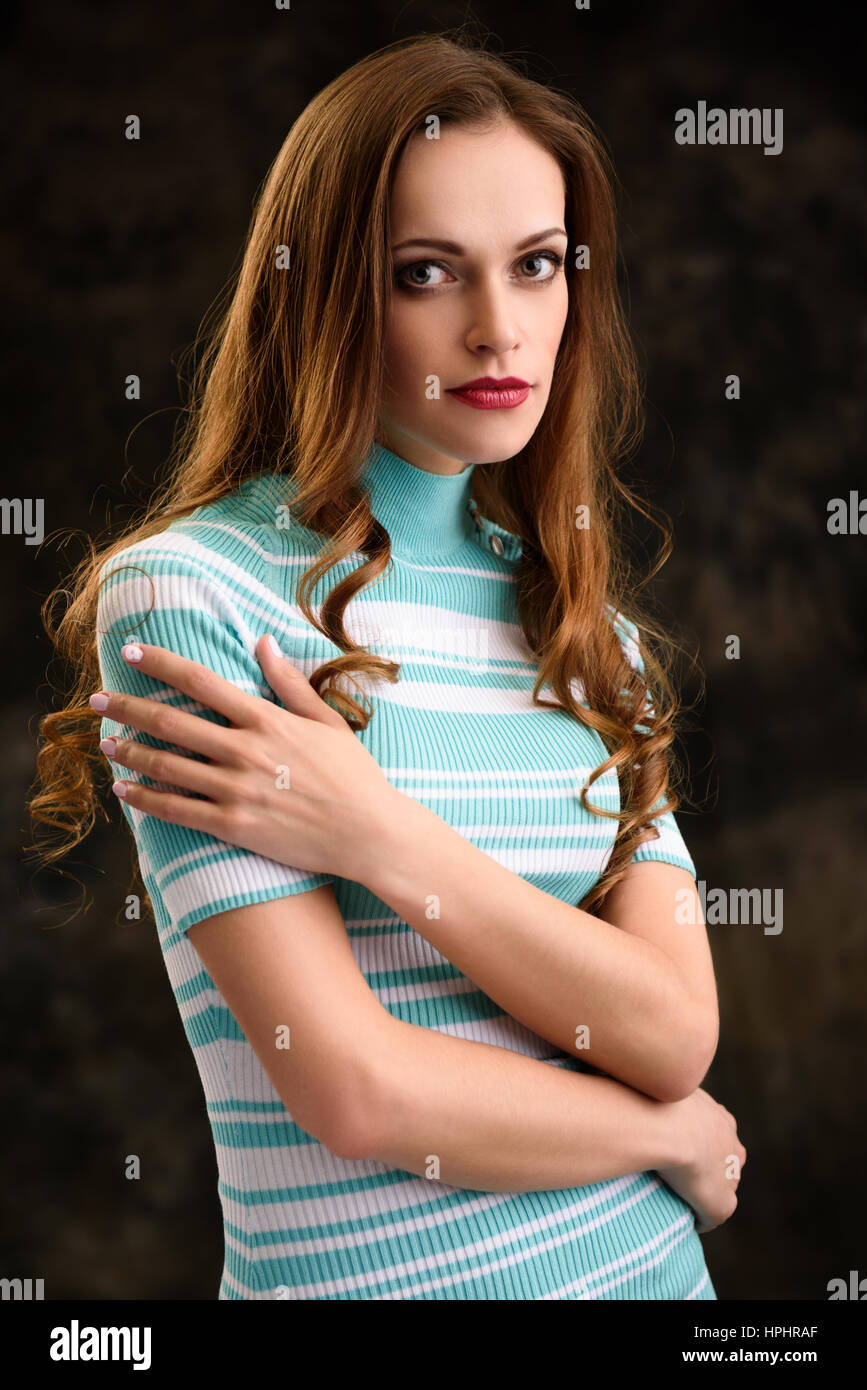 portrait of a pretty girl over dark background Stock Photo - Alamy