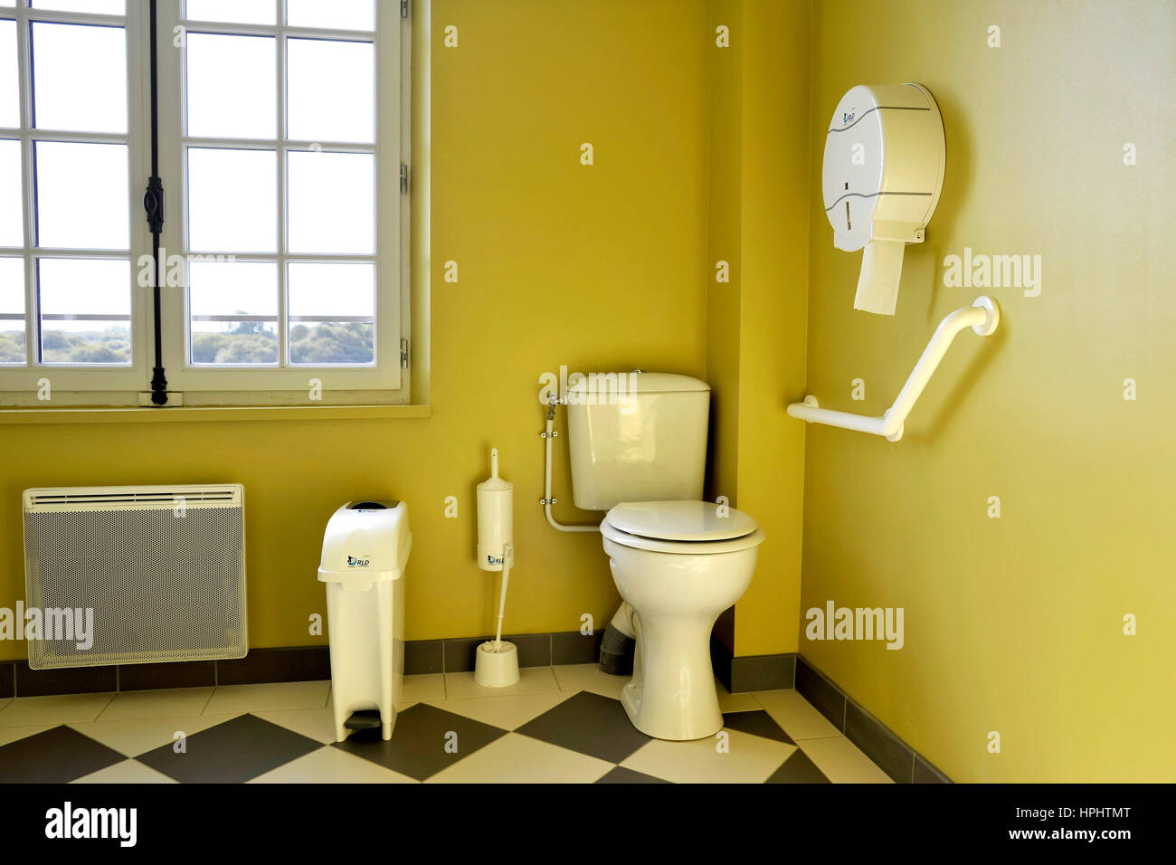 Toilets equipped for disabled person in a public building Stock Photo