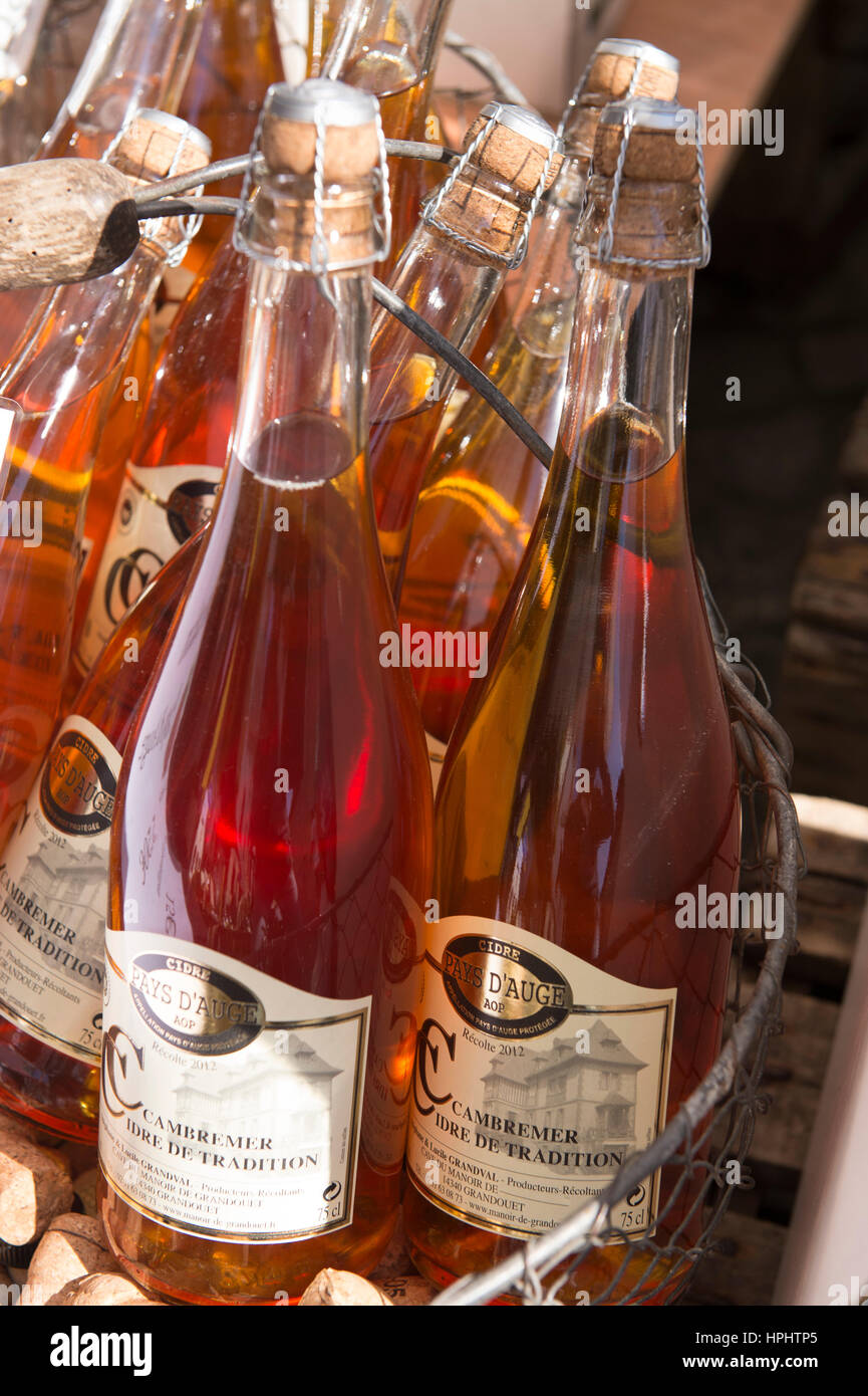 France, Normandy, bottles of cider in a metal basket Stock Photo Alamy
