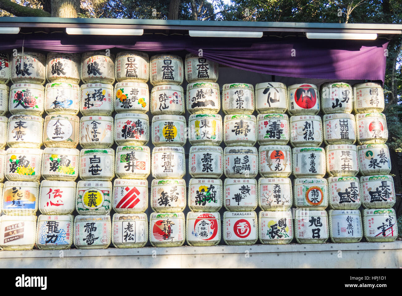 Barrels of sake on display at Meiji Shrine, Shibuya, Tokyo. Stock Photo